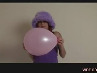 Sexy call girl rubs Pussy against balloon
